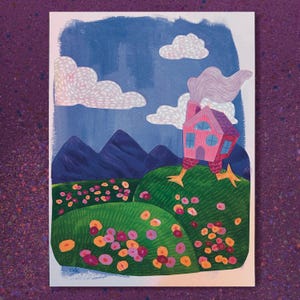 May include: A whimsical illustration of a pink house with chicken legs standing on a grassy hill. The house has blue window crosses and a purple roof. The background features mountains, clouds, and a blue sky. Colorful flowers dot the green landscape.