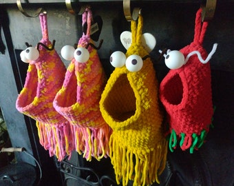 Monstruos de crochet para almacenar y colgar plantas