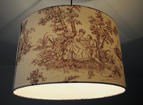 Abat jour tambour. Jacquard de coton contrecollé. Motifs floraux vieil or sur fond bleu. Tissu Canovas