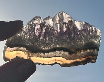 Polished Brazilian amethyst slice with banded agate base #2