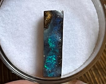 Gemmy blue Australian Boulder opal pendant/ ring stone. 4.85 carat, 4.7 x 16.7mm