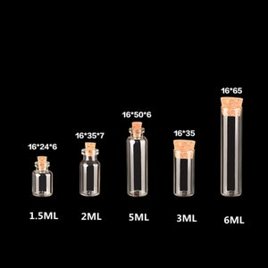 May include: Five glass bottles with cork stoppers in various sizes. The bottles are labeled with their volume in milliliters: 1.5ML, 2ML, 5ML, 3ML, and 6ML.