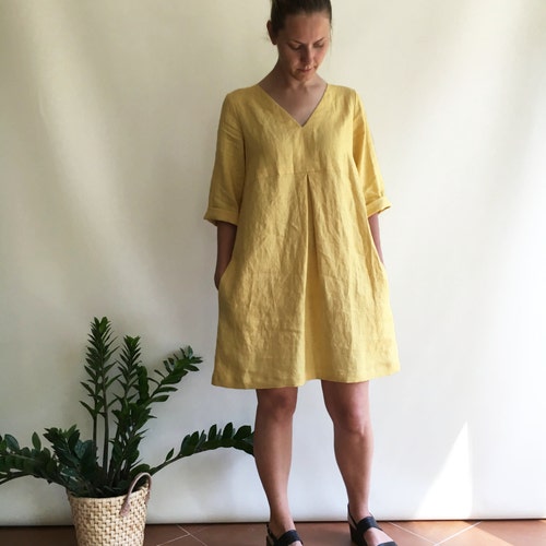 chinese dress ladies Women's Linen Tunic Dress Cute V Neck Long Sleeve Casual Loose Flowy Swing  Ruffle Dresses Pleated A Line Mini Dress Brown at Amazon Women's Clothing  store main image 0