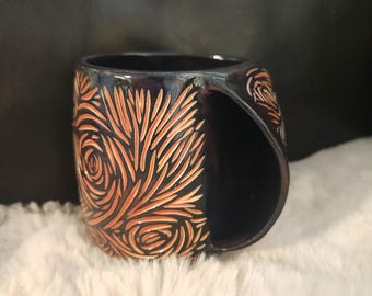 Taza calentadora tallada a mano