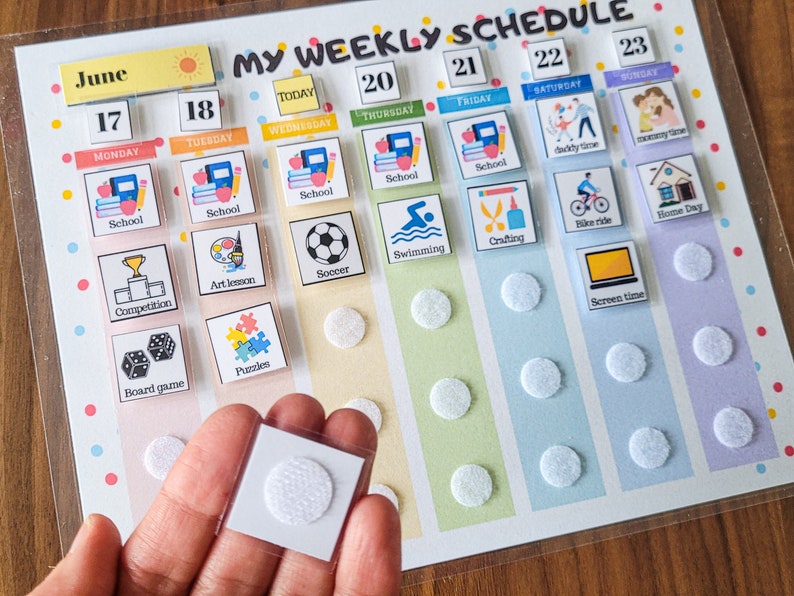 May include: A colourful weekly schedule chart with a June calendar and icons for activities such as school, art lesson, soccer, swimming, crafting, bike ride, home day, and screen time. The chart is designed for a child and uses bright colours and simple illustrations.