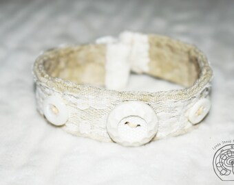 Modern lace and four vintage buttons - Handstitched Fabric Cuff