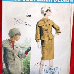 May include: Vintage Vogue Couturier Design sewing pattern 1306 by Fabiani of Italy. The cover features illustrations of a woman in a mustard-colored skirt suit and a tweed suit. The text "VOGUE COUTURIER DESIGN" is at the top.