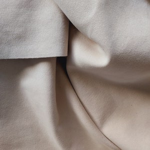 Pale tan Ultrasuede in two pieces 23 x 55 and 56 x 55