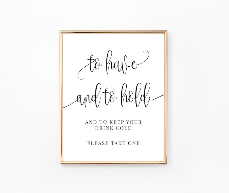 May include: A gold-framed sign with the text "to have and to hold" in cursive script. Below the text, it reads "And to keep your drink cold. Please take one."