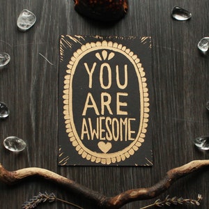 Handgefertigter Linoldruck ""You Are Super"" Gold Edition - Postkartenformat."