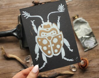 Handmade Beetle Linocut Artprint in Gold and White - Postcard Format