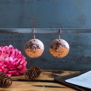 Round hammered copper earrings