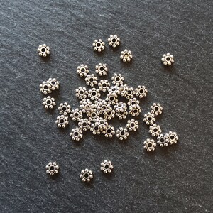 Daisy spacer best sale beads