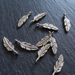 10 or 50 Feather Charms Antique Silver Tone 23x6mm