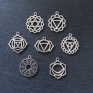 1 Full Set of The Seven Chakras Pendants in Antique Silver Tone Metal Alloy average 30x25mm