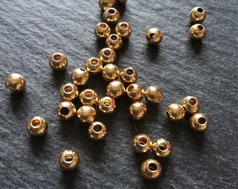 Wholesale 18K Solid Gold 6mm Round Beads.