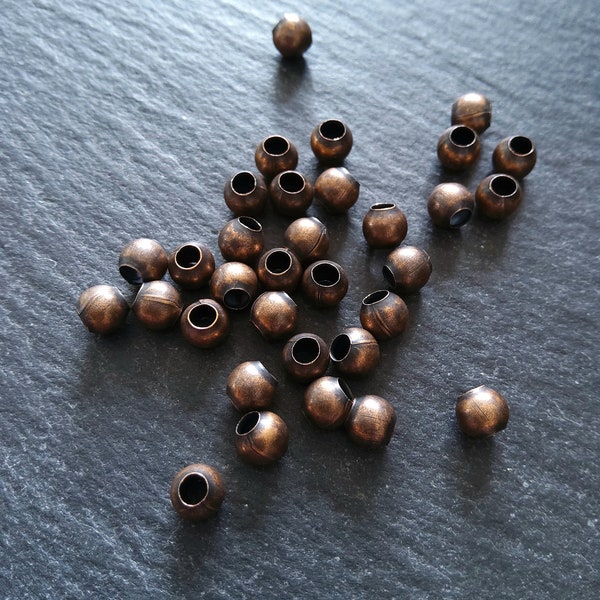 200 or 1000 Antique Copper Tone 5mm Round Hollow Spacer Beads 2.5mm Hole