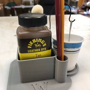 Leather dye holder