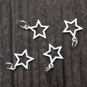 4 sterlingzilveren sterbedels,kleine sterbedels