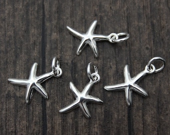 4 sjöstjärnor i sterlingsilver, havs- och strandberlocker
