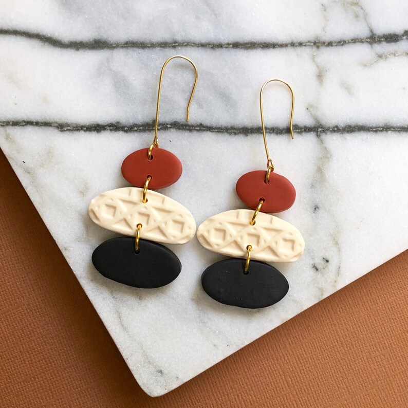 hook earrings in terra cotta Polymer clay statement earrings black and ivory
