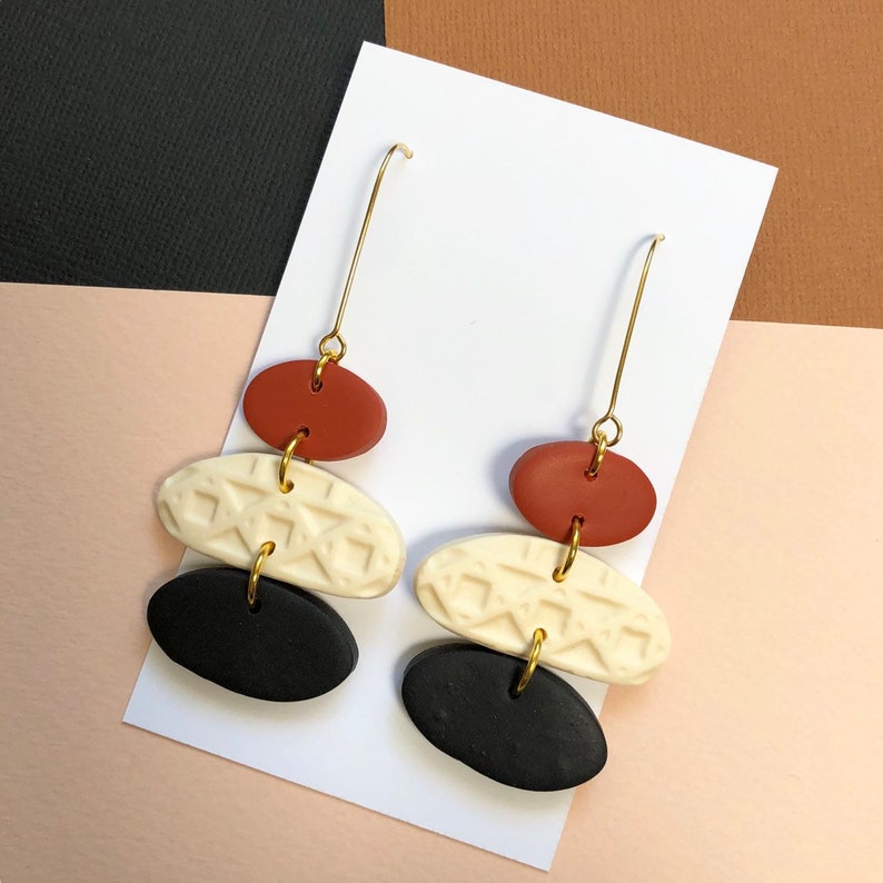 hook earrings in terra cotta Polymer clay statement earrings black and ivory