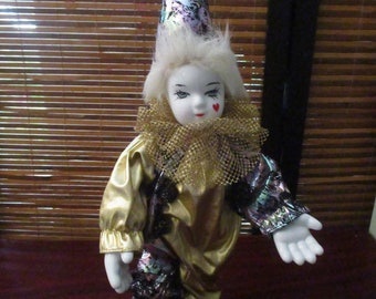 musical porcelain clown doll