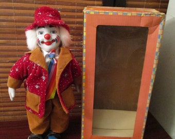 musical porcelain clown doll