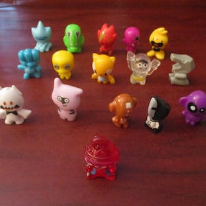 Gogos Crazy Bones Collection of Sixteen Go Gos image 1