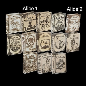 May include: A collection of fourteen rectangular wooden book-shaped ornaments featuring laser-engraved Disney movie titles and character illustrations including Lady and the Tramp, Alice in Wonderland, Wall-E, Peter Pan, The Little Mermaid, Beauty and the Beast, Aladdin, Pinocchio, The Lion King, 101 Dalmatians, Snow White, and Cinderella.