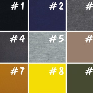 May include: Nine fabric swatches in different colors and textures. The swatches are numbered 1 through 9. The colors are black, navy blue, gray, dark gray, light gray, beige, orange, yellow, and green.