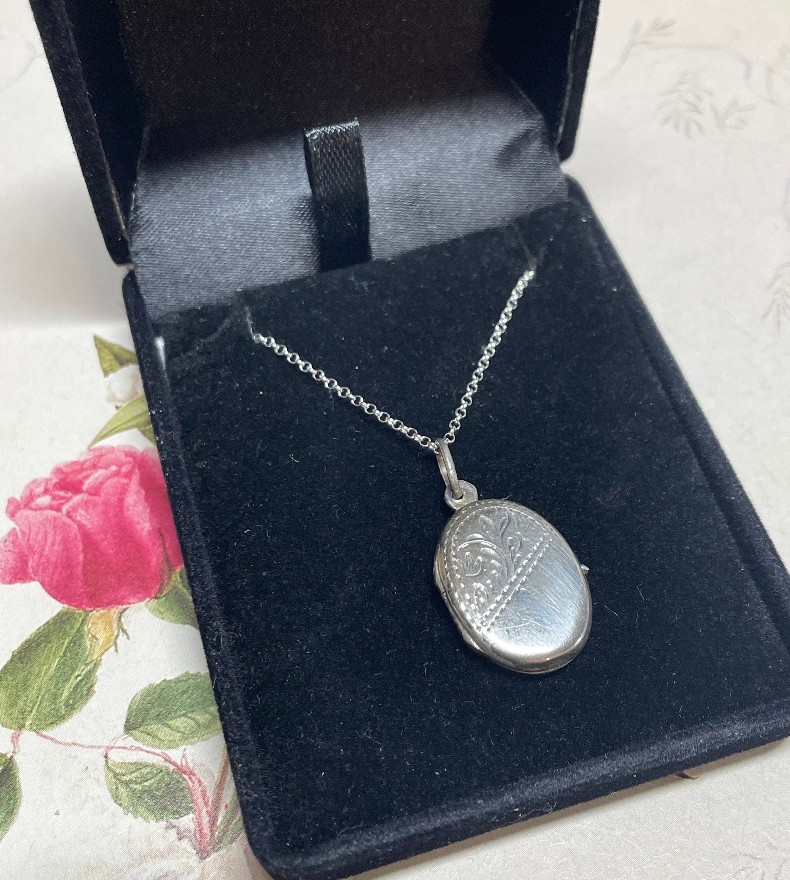 Preowned Sterling Silver Small Oval Engraved Locket Pendant