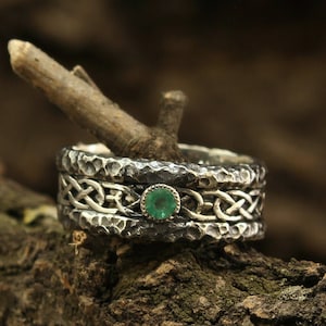 Hammered antique style sterling silver celtic wedding band with emerald for women or men