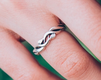 Sterling silver scrollwork ring with delicate leaves will be an original gift for a wedding, birthday or anniversary