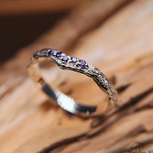 Stackable silver ring with four dainty amethysts for woman.Thin and tiny promise ring with purple gemstones