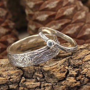 Wood bark Silver wedding band set his and hers, Her London blue Topaz ring and His flat tree band in forest twig style