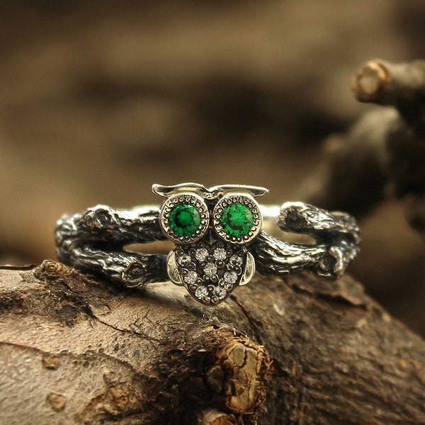 Owl on the branch silver engagement ring with emeralds