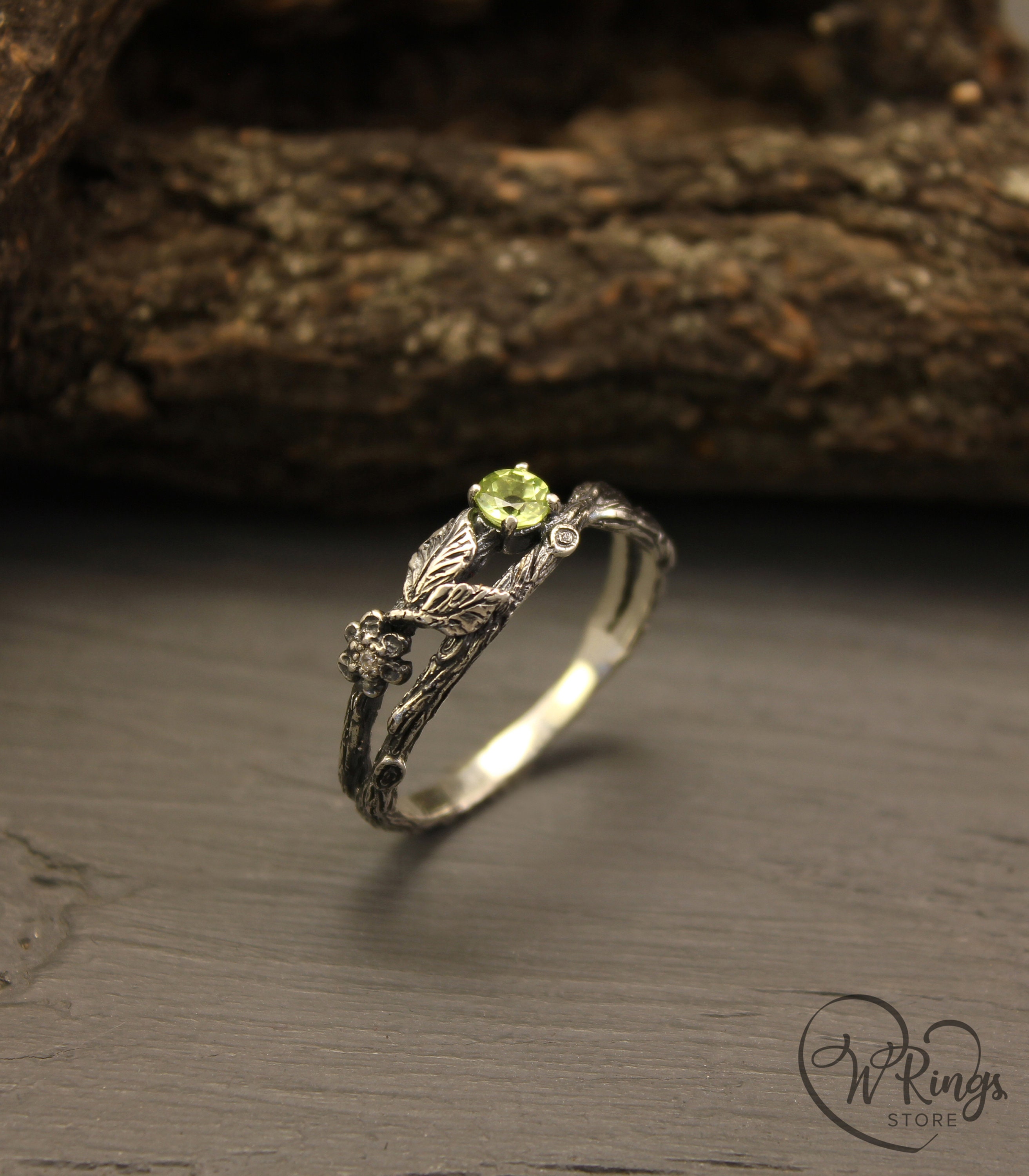 Dainty Branch and Leaves Peridot Ring Flower on the Twig picture