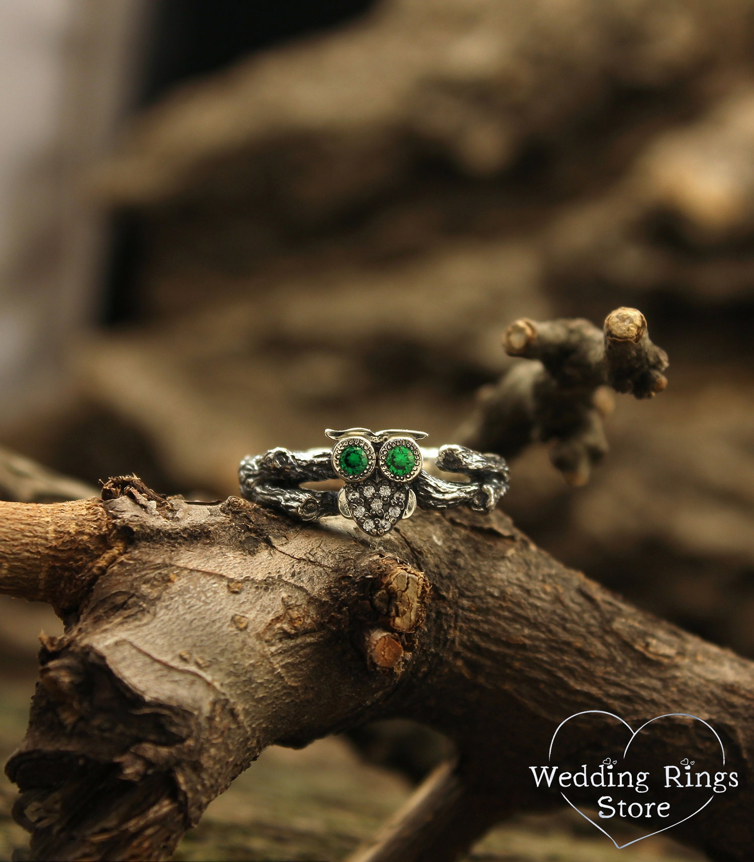 Owl on the branch silver engagement ring with emeralds
