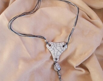 Multi-strand necklace with raku pendant