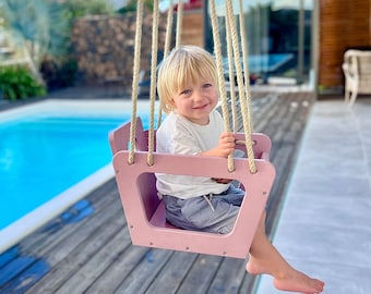 Pink wooden children's swing for outdoor use and gardens. Toddler swing, wooden swing, garden swing, baby swing