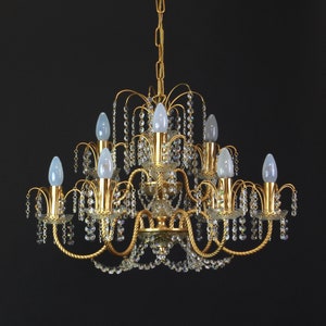 Stunning brass and crystal glass chandelier , Germany, 1960s