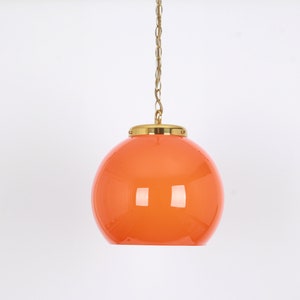 Orange glass Pendant light by Peill Putzler, Germany, 1970