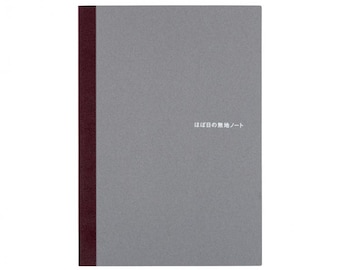 May include: A grey notebook with a burgundy spine. The notebook has the text "日々の日課ノート" printed on the front.