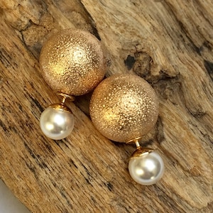 Classy French style gold and white front and back earrings. Double sided studs with 2 pearls.