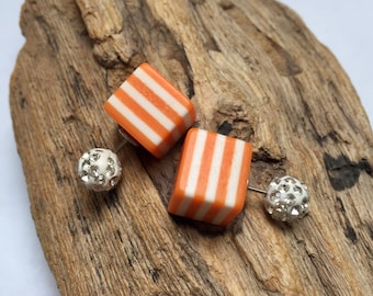Square orange and white striped double sided earrings, front and back French style studs with stripes.