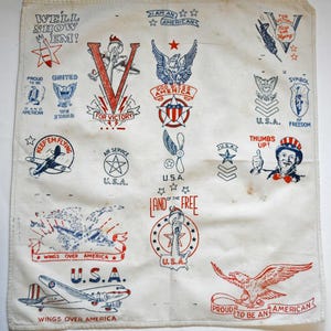 May include: A vintage white handkerchief with patriotic red and blue illustrations. Designs include eagles, airplanes, stars, and the Statue of Liberty, with text like "Wings Over America" and "Land of the Free."