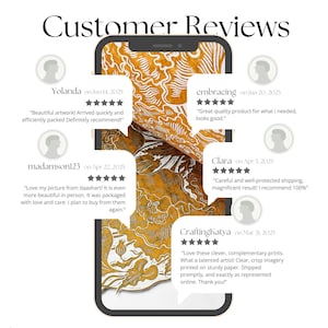 May include: A smartphone screen displays customer reviews for artwork. The reviews include star ratings and comments about the artwork's quality, shipping, and the artist. The background features a detailed, golden-toned artwork.