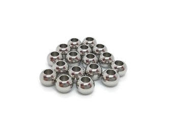 Perles séparateurs acier inoxydable - 6 x 4,5 mm - Intercalaires . Perles métal argenté. Finition bracelet. Bijoux