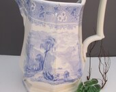 C1850 Romantic Staffordshire Pitcher 9inch light blue transferware, castle, trees, water, ruins scene